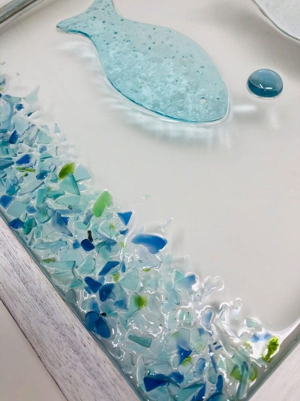fish resin artwork made with sea glass and drift wood